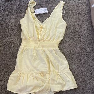 Cute romper for sale !! Never wore yet!